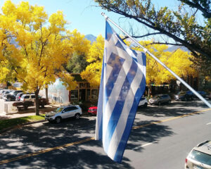 Jake and Telly’s Patio View, Greek flag and Fall leaves